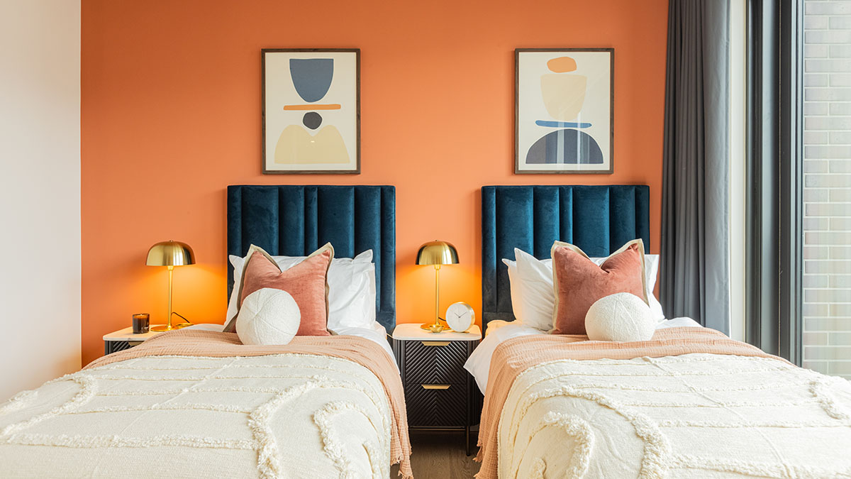 Full view of a stylish twin bedroom, demonstrating professional furnishing impact for London property investors